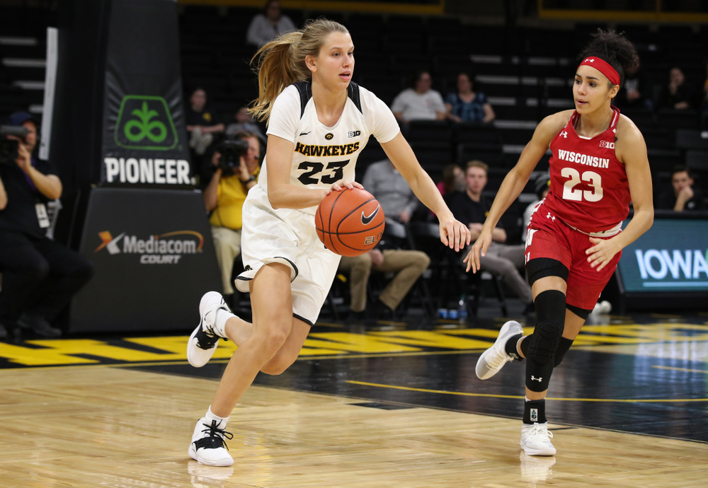 Iowa Hawkeyes forward Logan Cook (23) against the Wisconsin Badgers Monday, January 7, 2019 at Carver-Hawkeye Arena. (Brian Ray/hawkeyesports.com)