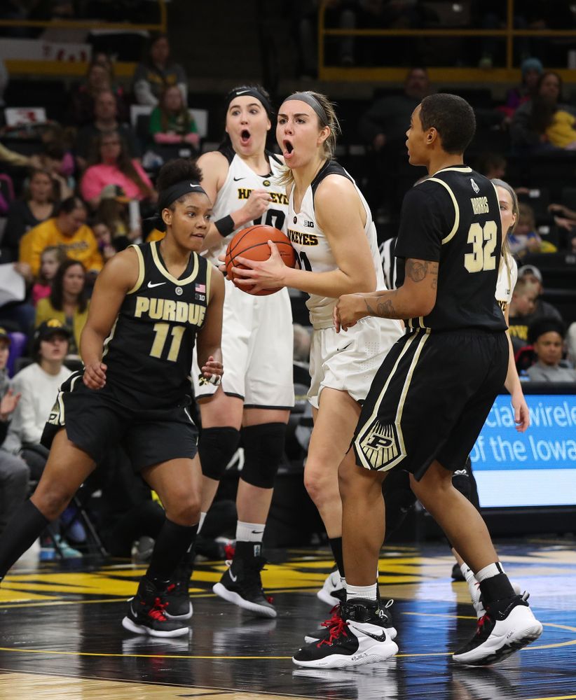 Iowa Hawkeyes forward Hannah Stewart (21) and forward Megan Gustafson (10) react after a foul call against the Purdue Boilermakers Sunday, January 27, 2019 at Carver-Hawkeye Arena. (Brian Ray/hawkeyesports.com)