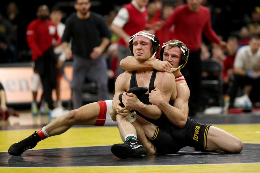 Iowa’s Kaleb Young wrestles Nebraska’s Peyton Rob at 157 pounds Saturday, January 18, 2020 at Carver-Hawkeye Arena. Young won the match 6-4. (Brian Ray/hawkeyesports.com)
