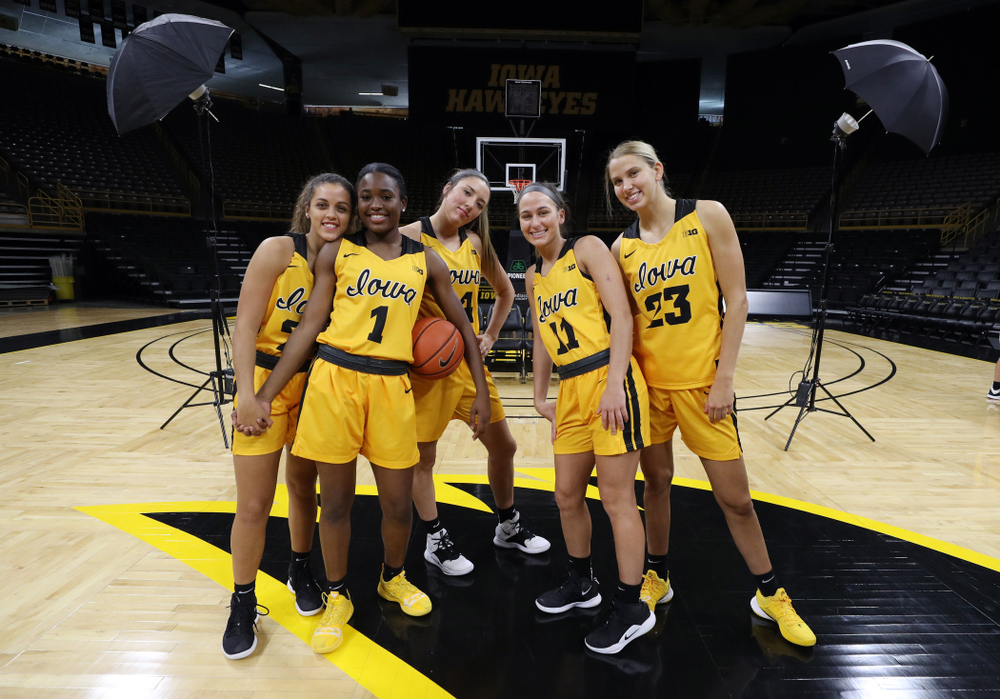 Iowa Hawkeyes guard Gabbie Marshall (24), guard Tomi Taiwo (1), forward McKenna Warnock (14), guard Megan Meyer (11), and Logan Cook (23) during the teamÕs annual media day Thursday, October 24, 2019 at Carver-Hawkeye Arena. (Brian Ray/hawkeyesports.com)