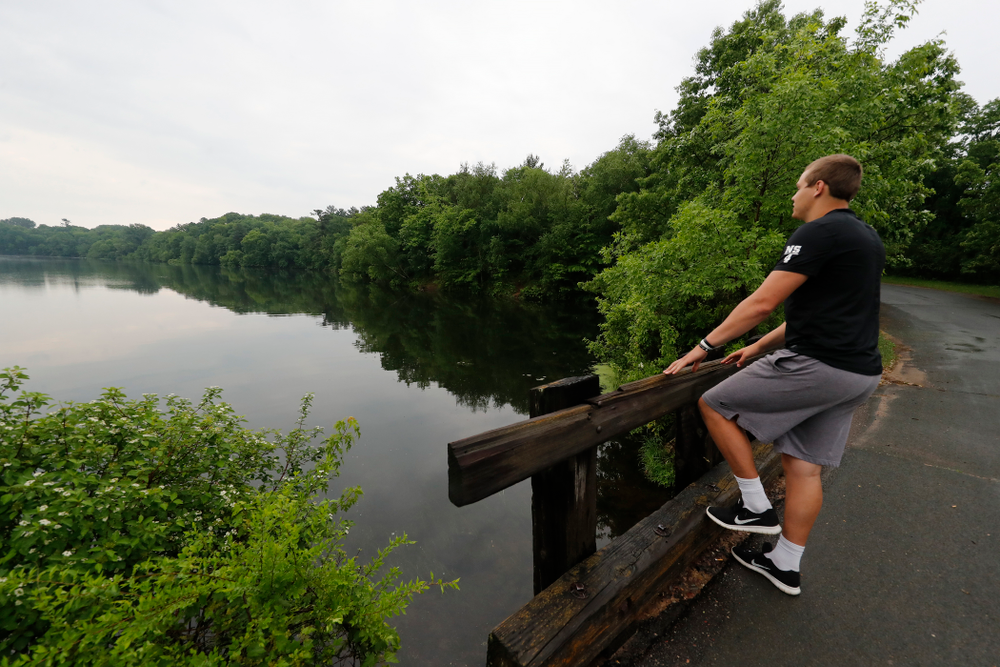 Iowa Hawkeyes quarterback Nathan Stanley (4) looks over the lake where he likes to fish with his friends Wednesday, May 30, 2018 in Menomonie, Wisc. (Brian Ray/hawkeyesports.com)