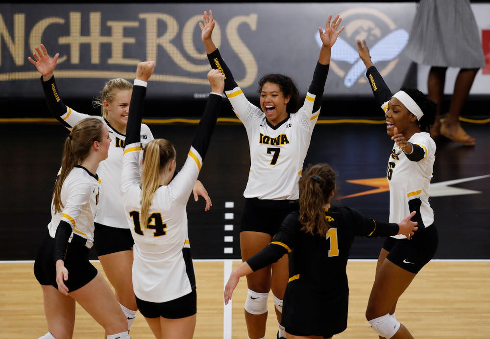 Iowa Hawkeyes setter Gabrielle Orr (7), right side hitter Reghan Coyle (8), and outside hitter Taylor Louis (16) against Eastern Illinois Sunday, September 9, 2018 at Carver-Hawkeye Arena. (Brian Ray/hawkeyesports.com)