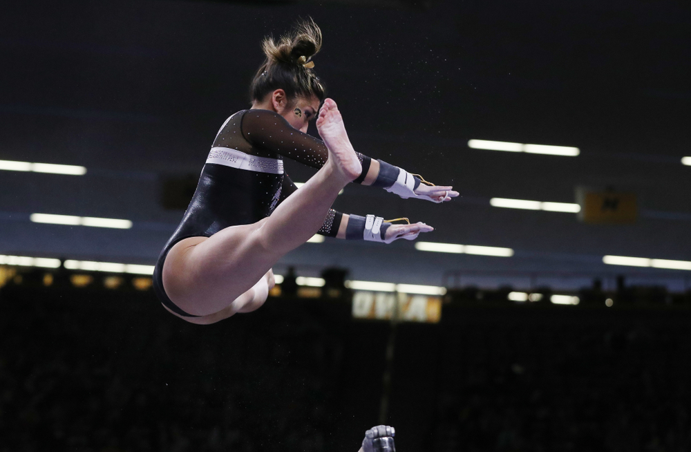 Iowa's Nicole Chowl competes on the bars against the Rutgers Scarlet Knights Saturday, January 26, 2019 at Carver-Hawkeye Arena. (Brian Ray/hawkeyesports.com)