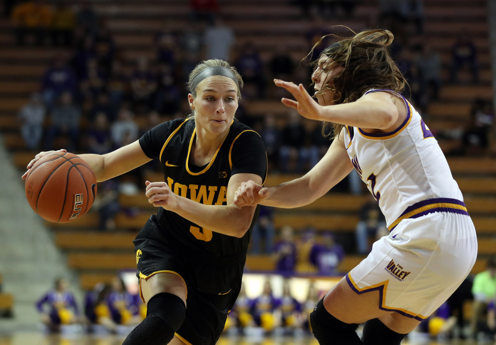 Iowa Hawkeyes guard Makenzie Meyer (3) drives to the hoop against Northern IowaÕs Rose Simon-Ressler (22) Sunday, November 17, 2019 at the McLeod Center. (Brian Ray/hawkeyesports.com)