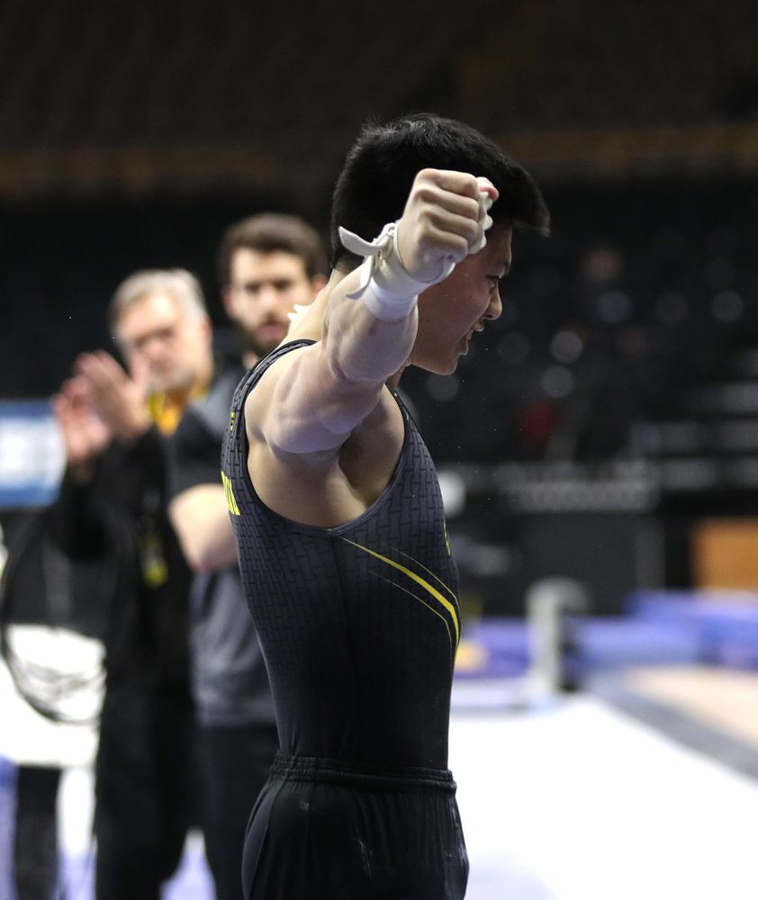 Iowa's Bennet Huang competes on the high bar against the Ohio State Buckeyes Saturday, March 16, 2019 at Carver-Hawkeye Arena. (Brian Ray/hawkeyesports.com)