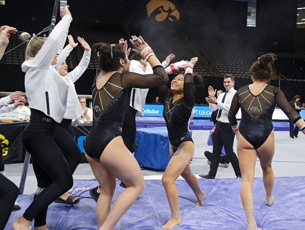 Iowa’s Clair Kaji competes on the bars during their meet at Carver-Hawkeye Arena in Iowa City on Sunday, March 8, 2020. (Stephen Mally/hawkeyesports.com)
