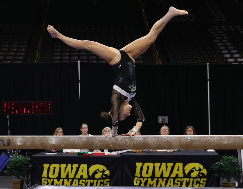 Iowa's Allie Gilchrist competes on the beam against the Rutgers Scarlet Knights Saturday, January 26, 2019 at Carver-Hawkeye Arena. (Brian Ray/hawkeyesports.com)