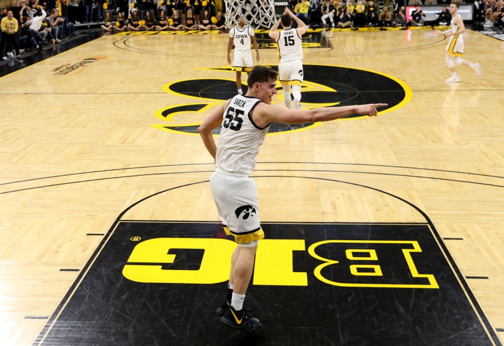 Iowa Hawkeyes forward Luka Garza (55) celebrates a dunk against Penn State Saturday, February 29, 2020 at Carver-Hawkeye Arena. (Brian Ray/hawkeyesports.com)