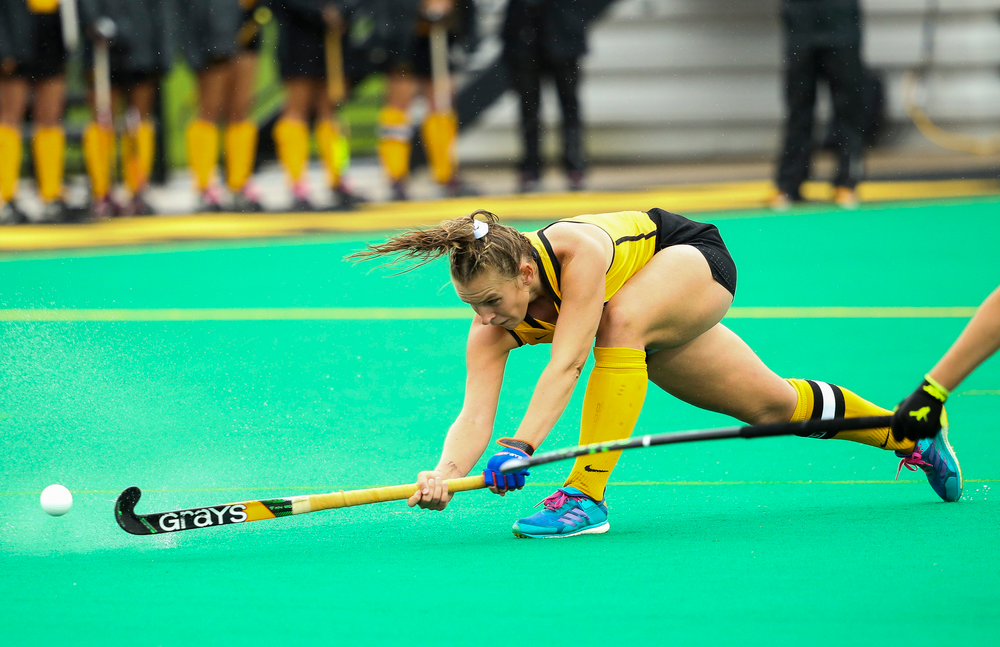 Iowa Hawkeyes midfielder Katie Birch (11) takes a shot on a penalty corner during a game against Stanford at Grant Field on October 7, 2018. (Tork Mason/hawkeyesports.com)