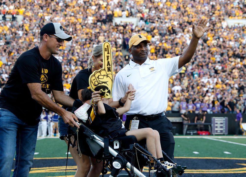 Kid Captain Quinn Stumpf and honorary captain Marvin Sims, Jr. against the Northern Iowa Panthers Saturday, September 15, 2018 at Kinnick Stadium. (Brian Ray/hawkeyesports.com)