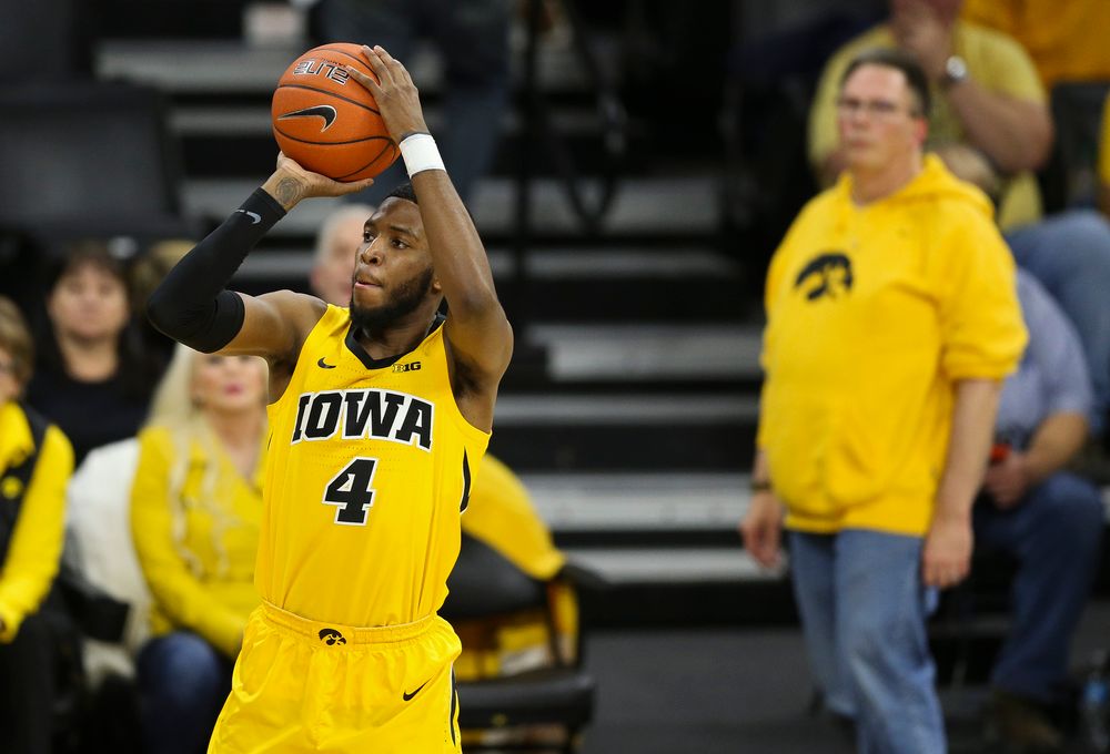 Iowa Hawkeyes guard Isaiah Moss (4) shoots the ball against Wisconsin on November 30, 2018 at Carver-Hawkeye Arena. (Tork Mason/hawkeyesports.com)