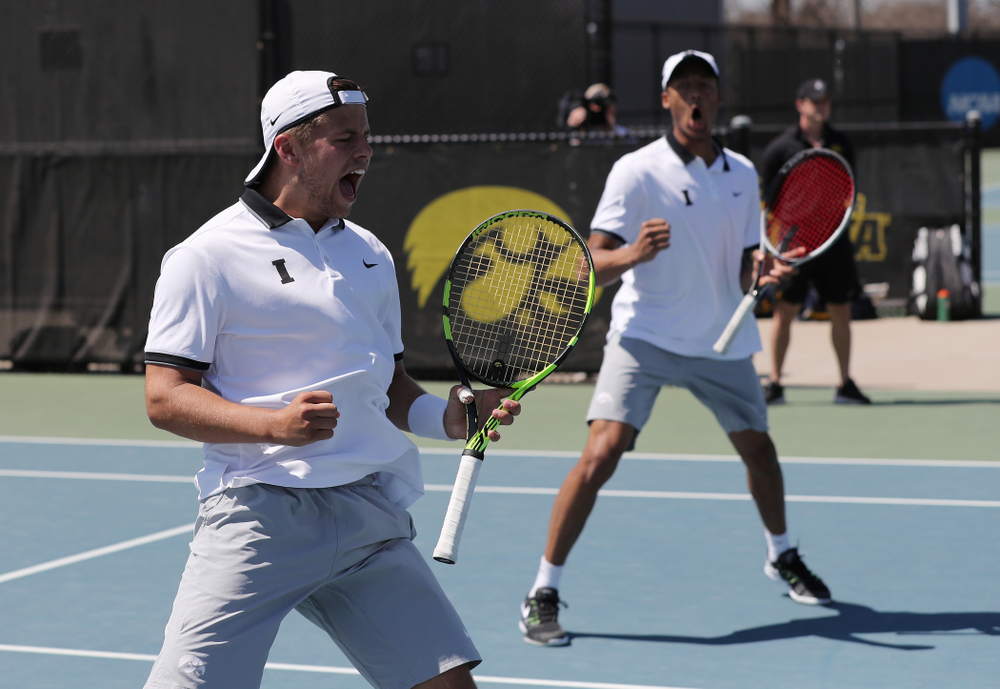 IowaÕs Oliver Okonkwo and Will Davies play a doubles match against the Michigan Wolverines Sunday, April 21, 2019 at the Hawkeye Tennis and Recreation Complex. (Brian Ray/hawkeyesports.com)