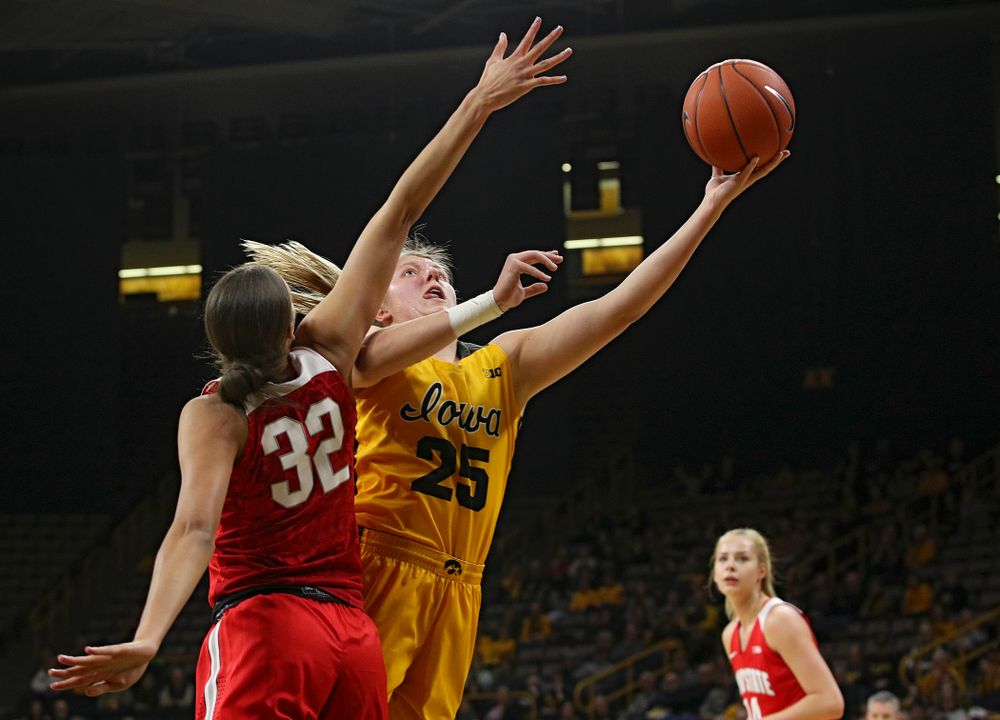Iowa Hawkeyes forward Monika Czinano (25) makes a basket during the first quarter of their game at Carver-Hawkeye Arena in Iowa City on Thursday, January 23, 2020. (Stephen Mally/hawkeyesports.com)