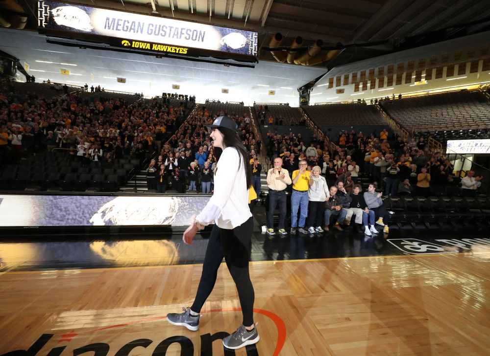 Iowa Hawkeyes forward Megan Gustafson (10) during a celebration of their Big Ten Women's Basketball Tournament championship Monday, March 18, 2019 at Carver-Hawkeye Arena. (Brian Ray/hawkeyesports.com)