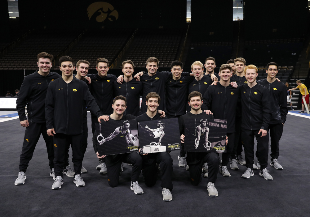 Iowa Men's Gymnastics seniors Jake Brodarzon, Kevin Johnson, and Rogelio Vazquez during senior day ceremonies following their meet against the Ohio State Buckeyes Saturday, March 16, 2019 at Carver-Hawkeye Arena. (Brian Ray/hawkeyesports.com)