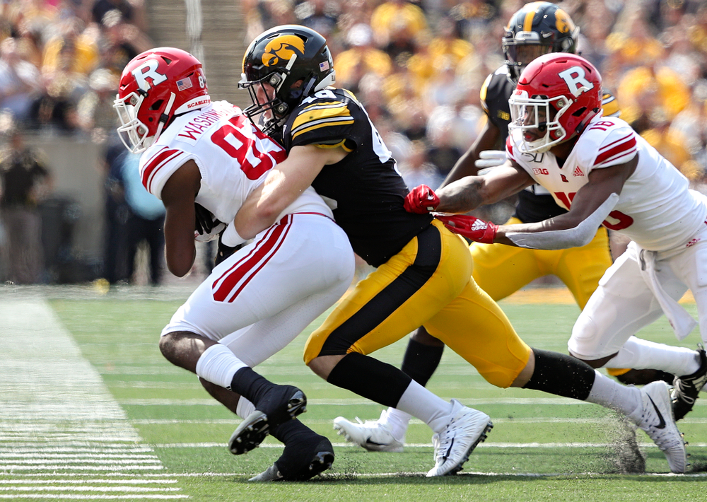 Iowa Hawkeyes linebacker Nick Niemann (49) makes a tackle during the second quarter of their Big Ten Conference football game at Kinnick Stadium in Iowa City on Saturday, Sep 7, 2019. (Stephen Mally/hawkeyesports.com)