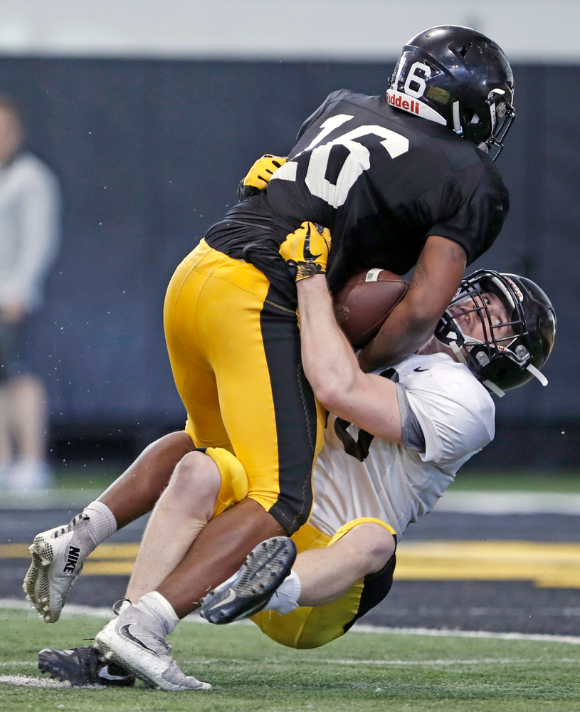 Kyshaun Bryan, John Milani -- University of Iowa spring football practice No. 6 on March 31, 2018, in Iowa City, Iowa. (Darren Miller/hawkeyesports.com)