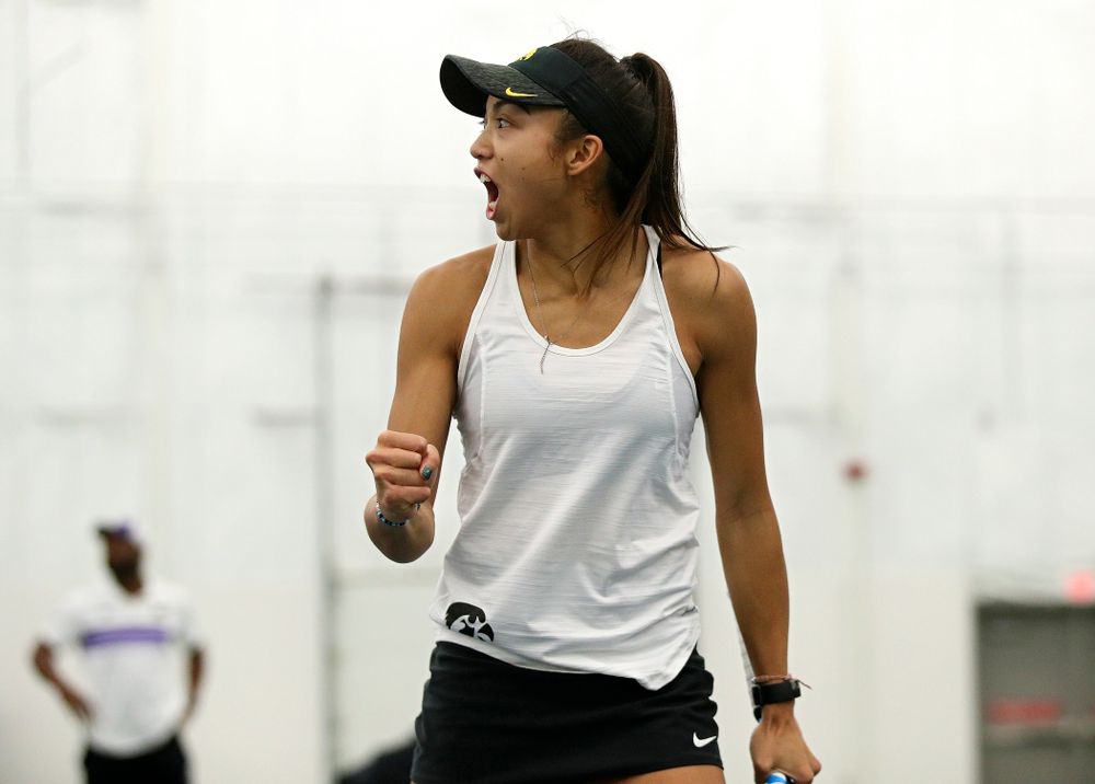 Iowa’s Michelle Bacalla celebrates a point during her doubles match at the Hawkeye Tennis and Recreation Complex in Iowa City on Sunday, February 23, 2020. (Stephen Mally/hawkeyesports.com)