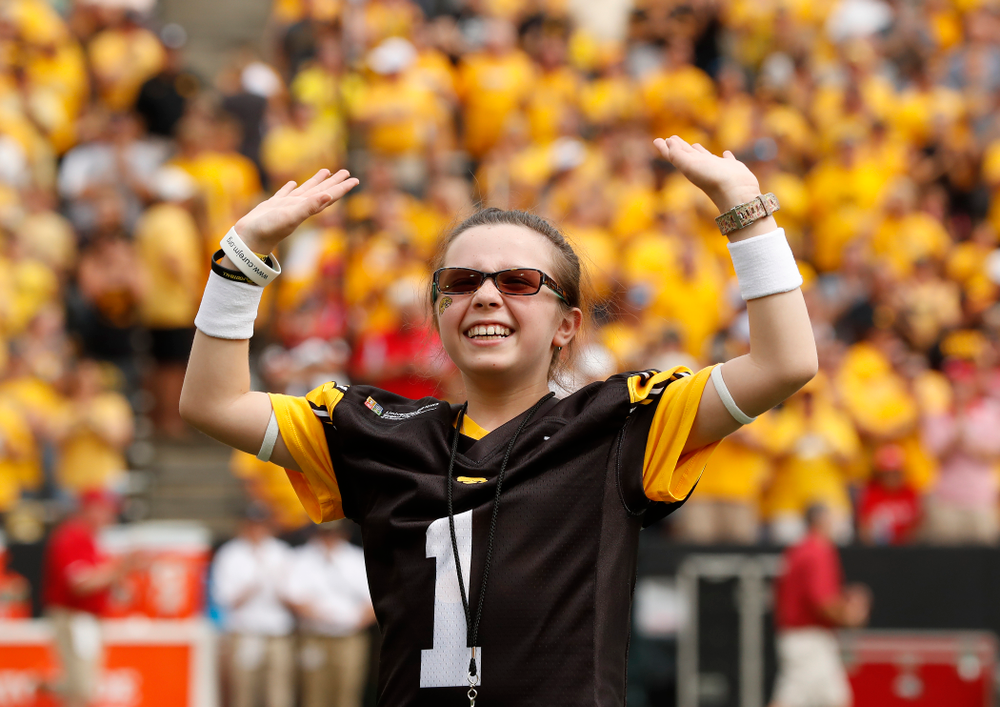 Honorary Captain Julian Vandervelde and the kid captain against the Northern Illinois Huskies Saturday, September 1, 2018 at Kinnick Stadium. (Brian Ray/hawkeyesports.com)