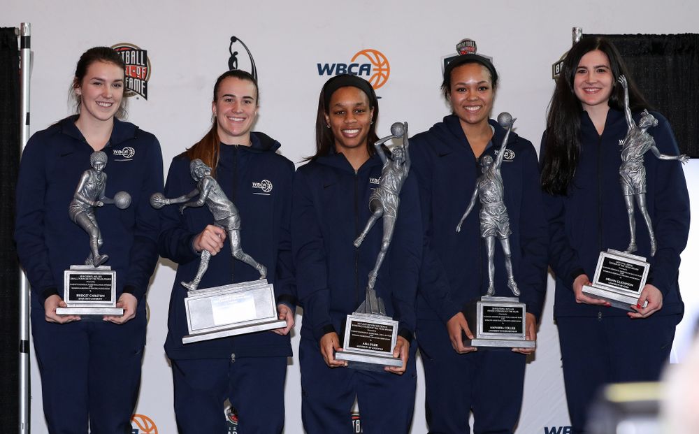 Lisa Leslie Award winner Iowa Hawkeyes forward Megan Gustafson (10) stands with the other members of the WBCA Naismith Starting 5 during a news conference Wednesday, April 4, 2018 at Amalie Arena in Tampa, FL. (Brian Ray/hawkeyesports.com)
