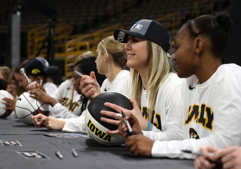 Iowa Hawkeyes forward Hannah Stewart (21) during a celebration of their Big Ten Women's Basketball Tournament championship Monday, March 18, 2019 at Carver-Hawkeye Arena. (Brian Ray/hawkeyesports.com)