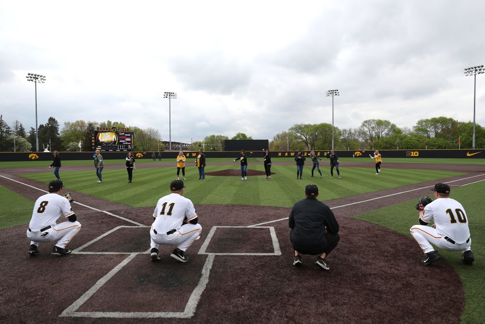 The senior moms throw out a first pitch before their game against Michigan State Sunday, May 12, 2019 at Duane Banks Field. (Brian Ray/hawkeyesports.com)