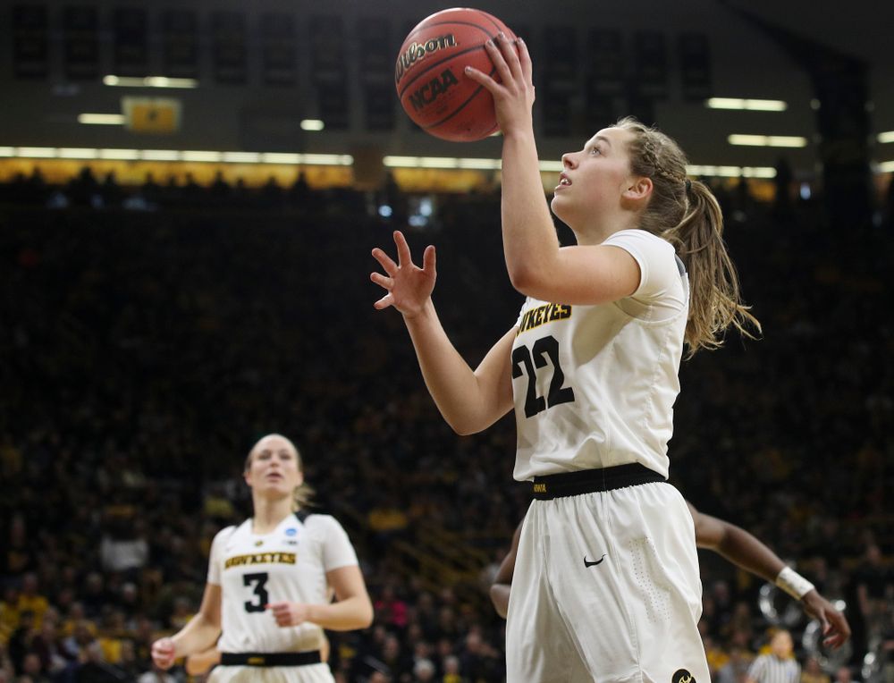 Iowa Hawkeyes guard Kathleen Doyle (22) scores a basket during the third quarter of their second round game in the 2019 NCAA Women's Basketball Tournament at Carver Hawkeye Arena in Iowa City on Sunday, Mar. 24, 2019. (Stephen Mally for hawkeyesports.com)