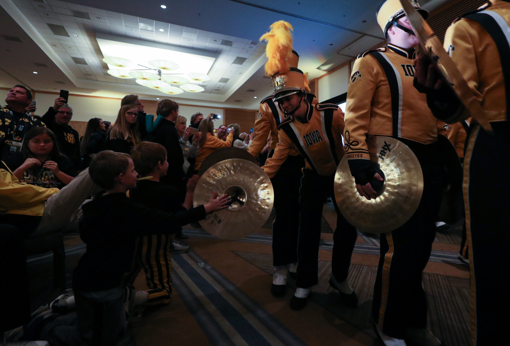 The Hawkeye Marching Band and the Iowa Spirit Squads perform during the Holiday Bowl Hawkeye Huddle Thursday, December 26, 2019 at the Hilton in downtown San Diego. (Brian Ray/hawkeyesports.com)