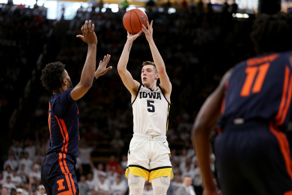 Iowa Hawkeyes guard CJ Fredrick (5) pulls up for a three point basket against the Illinois Fighting Illini Sunday, February 2, 2020 at Carver-Hawkeye Arena. (Brian Ray/hawkeyesports.com)