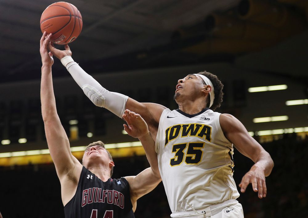 Iowa Hawkeyes forward Cordell Pemsl (35) goes up for a rebound during a game against Guilford College at Carver-Hawkeye Arena on November 4, 2018. (Tork Mason/hawkeyesports.com)