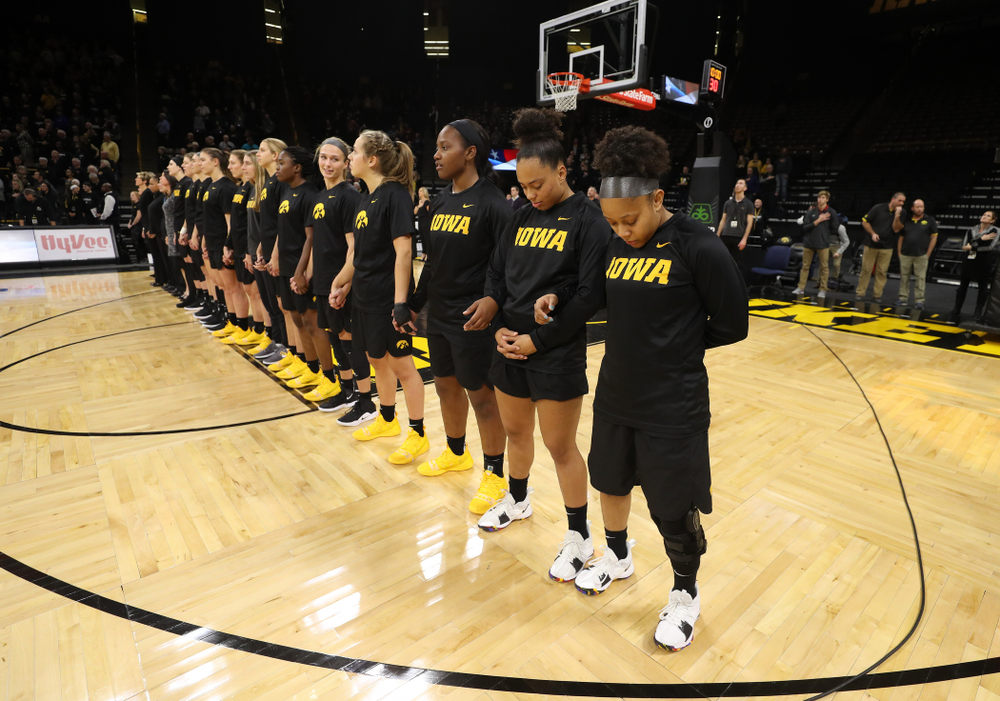The Iowa Hawkeyes stand for the National Anthem before their game against the Iowa State Cyclones in the Iowa Corn Cy-Hawk Series Wednesday, December 5, 2018 at Carver-Hawkeye Arena. (Brian Ray/hawkeyesports.com)