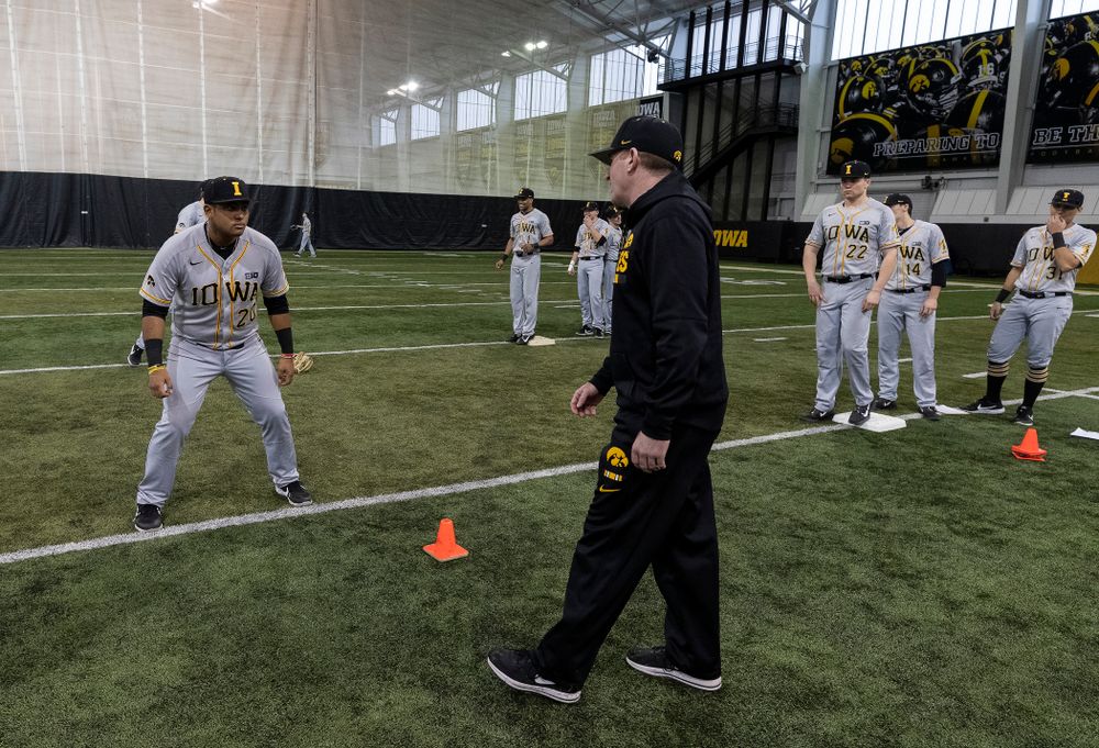 Iowa Hawkeyes associate head coach Marty Sutherland works on base running following the team's annual media day Tuesday, February 5, 2019 in the Indoor Practice Facility. (Brian Ray/hawkeyesports.com)