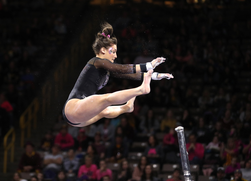 Iowa's Jax Krantz competes on the bars during their meet against the Minnesota Golden Gophers Saturday, January 19, 2019 at Carver-Hawkeye Arena. (Brian Ray/hawkeyesports.com)