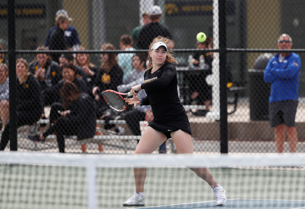 Elise Van Heuvelen and Anastasia Reimchen play a doubles match against the Wisconsin Badgers Sunday, April 22, 2018 at the Hawkeye Tennis and Recreation Center. (Brian Ray/hawkeyesports.com)