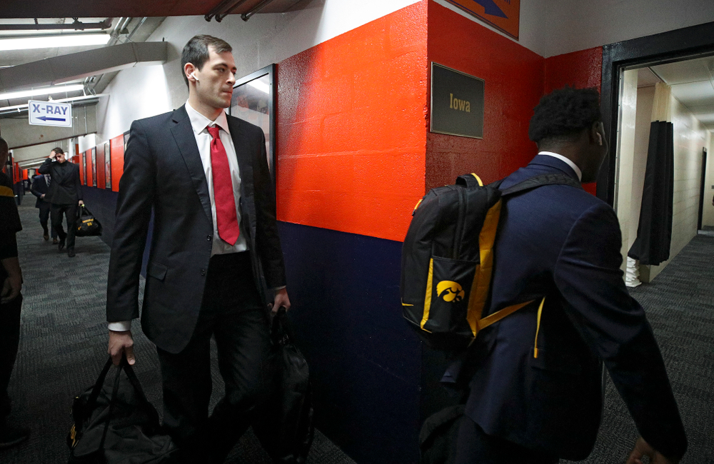 Iowa Hawkeyes forward Ryan Kriener (15) walks to the locker room as the team arrives before their ACC/Big Ten Challenge game at the Carrier Dome in Syracuse, N.Y. on Tuesday, Dec 3, 2019. (Stephen Mally/hawkeyesports.com)