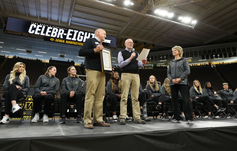 Iowa City Mayor Jim Throgmorton and Coralville Mayor John Lundell present Iowa Hawkeyes head coach Lisa Bluder with a joint proclamation designating April 24, 2019 as Iowa WomenÕs Basketball Day during the teamÕs Celebr-Eight event Wednesday, April 24, 2019 at Carver-Hawkeye Arena. (Brian Ray/hawkeyesports.com)