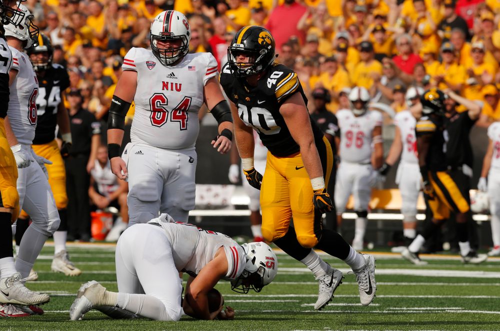 Iowa Hawkeyes defensive end Parker Hesse (40) sacks Northern Illinois Huskies quarterback Marcus Childers (15) Saturday, September 1, 2018 at Kinnick Stadium. (Brian Ray/hawkeyesports.com)