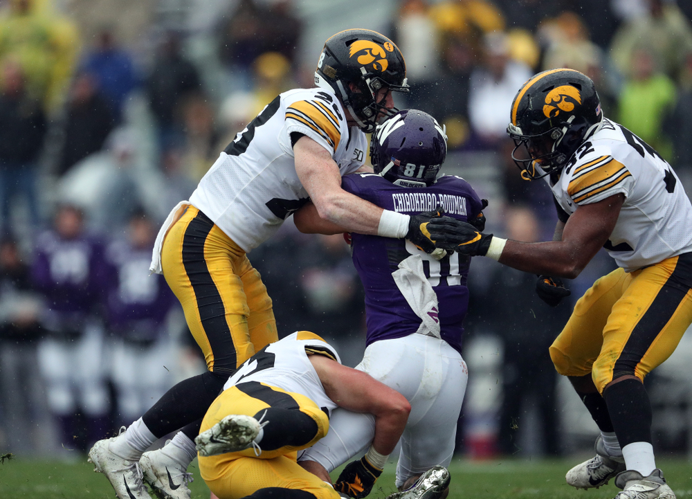 Iowa Hawkeyes defensive back Jack Koerner (28) and linebacker Djimon Colbert (32) against the Northwestern Wildcats Saturday, October 26, 2019 at Ryan Field in Evanston, Ill. (Brian Ray/hawkeyesports.com)