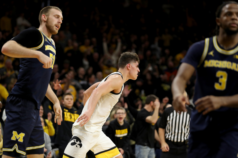 Iowa Hawkeyes forward Luka Garza (55) knocks down a shot against the Michigan Wolverines Friday, January 17, 2020 at Carver-Hawkeye Arena. (Brian Ray/hawkeyesports.com)