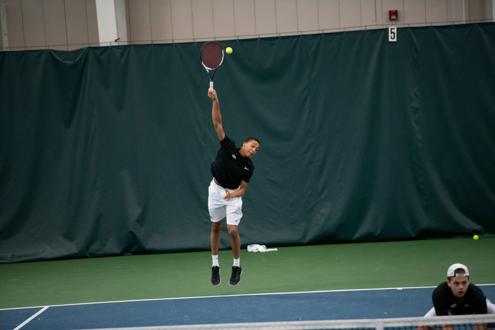 The Iowa men's tennis team competes against Cornell in The Rise Tennis Center in Ithaca, NY on Sunday, Feb. 24, 2019.