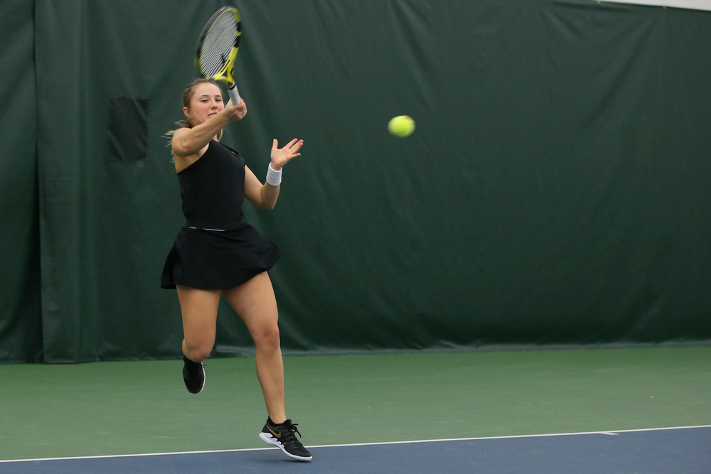 Iowa’s Danielle Burich returns a hit during the Iowa women’s tennis meet vs UNI on Saturday, February 29, 2020 at the Hawkeye Tennis and Recreation Complex. (Lily Smith/hawkeyesports.com)