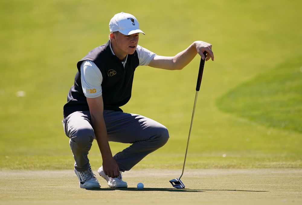 Iowa's Benton Weinberg lines up a putt during the first round of the Hawkeye Invitational at Finkbine Golf Course in Iowa City on Saturday, Apr. 20, 2019. (Stephen Mally/hawkeyesports.com)