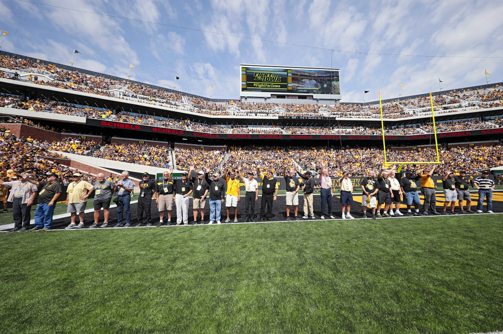 Members of the Iowa Hawkeyes 1969 football team are recognized during the third quarter of their Big Ten Conference football game at Kinnick Stadium in Iowa City on Saturday, Sep 7, 2019. (Stephen Mally/hawkeyesports.com)