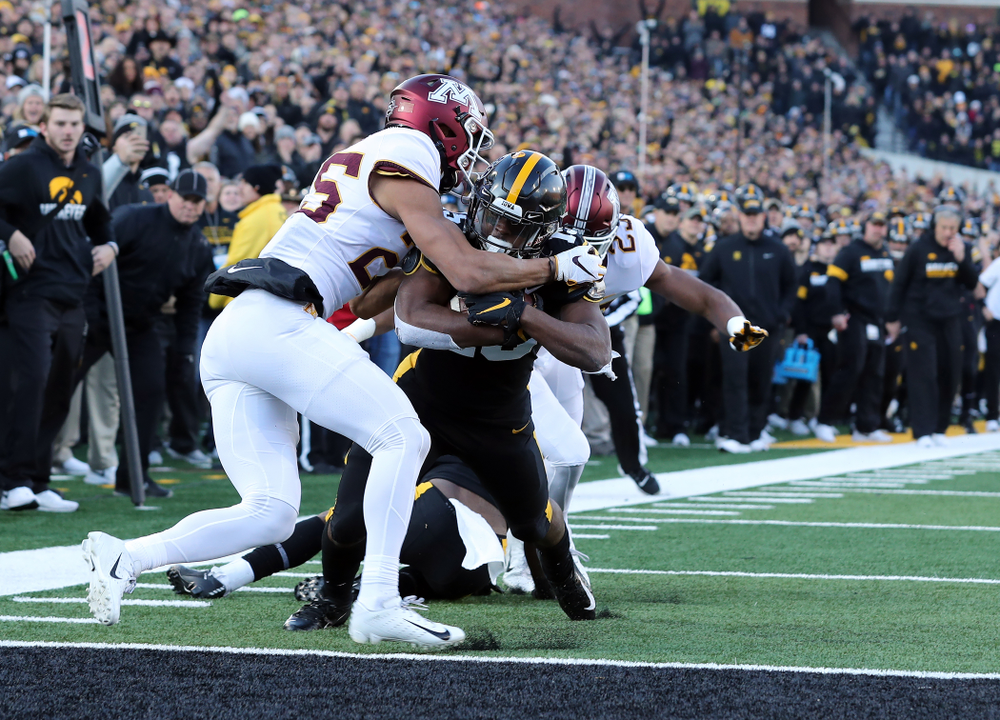 Iowa Hawkeyes running back Tyler Goodson (15) scores against the Minnesota Golden Gophers Saturday, November 16, 2019 at Kinnick Stadium. (Brian Ray/hawkeyesports.com)