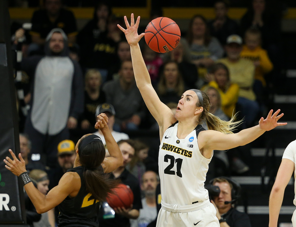 Iowa Hawkeyes forward Hannah Stewart (21) steals a pass during the third quarter of their second round game in the 2019 NCAA Women's Basketball Tournament at Carver Hawkeye Arena in Iowa City on Sunday, Mar. 24, 2019. (Stephen Mally for hawkeyesports.com)