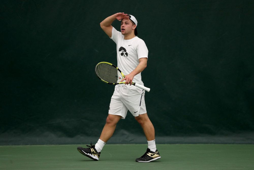 Iowa’s Will Davies against Cornell Sunday, March 8, 2020 at the Hawkeye Tennis and Recreation Center. (Brian Ray/hawkeyesports.com)