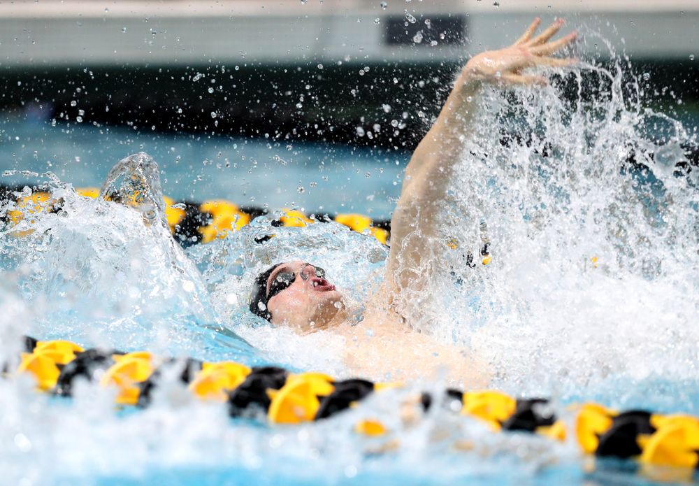 Iowa's Kenneth Mende swims the backstroke leg of the 200 medley relay at the 2019 Big Ten Swimming and Diving meet Wednesday, February 27, 2019 at the Campus Wellness and Recreation Center. (Brian Ray/hawkeyesports.com)