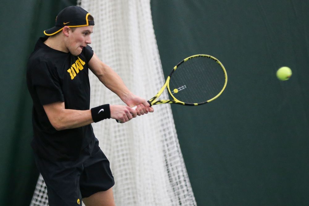 Iowa’s Joe Tyler returns a hit during the Iowa men’s tennis meet vs VCU on Saturday, February 29, 2020 at the Hawkeye Tennis and Recreation Complex. (Lily Smith/hawkeyesports.com)