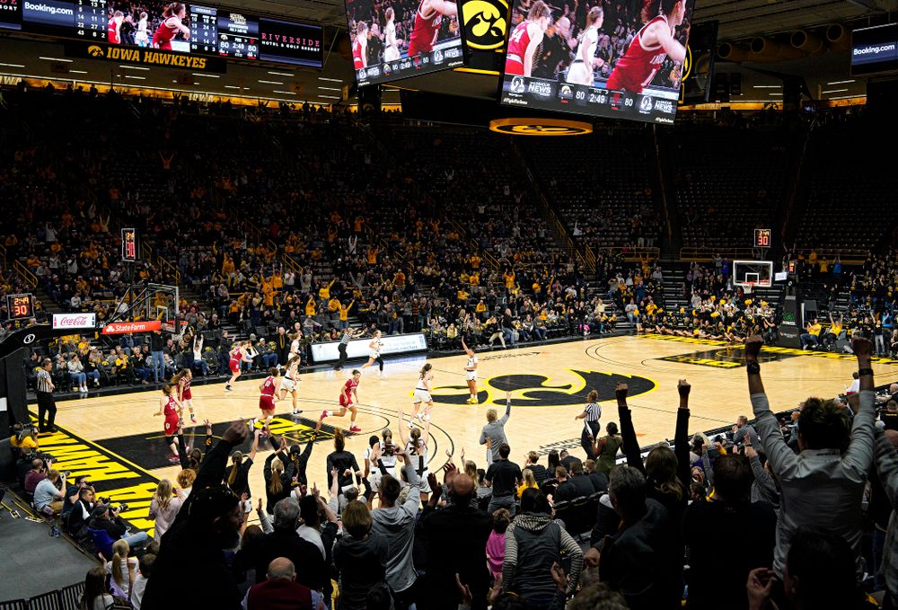 The crowd reacts after Iowa Hawkeyes guard Makenzie Meyer (3) made a 3-pointer during the second overtime period of their game at Carver-Hawkeye Arena in Iowa City on Sunday, January 12, 2020. (Stephen Mally/hawkeyesports.com)