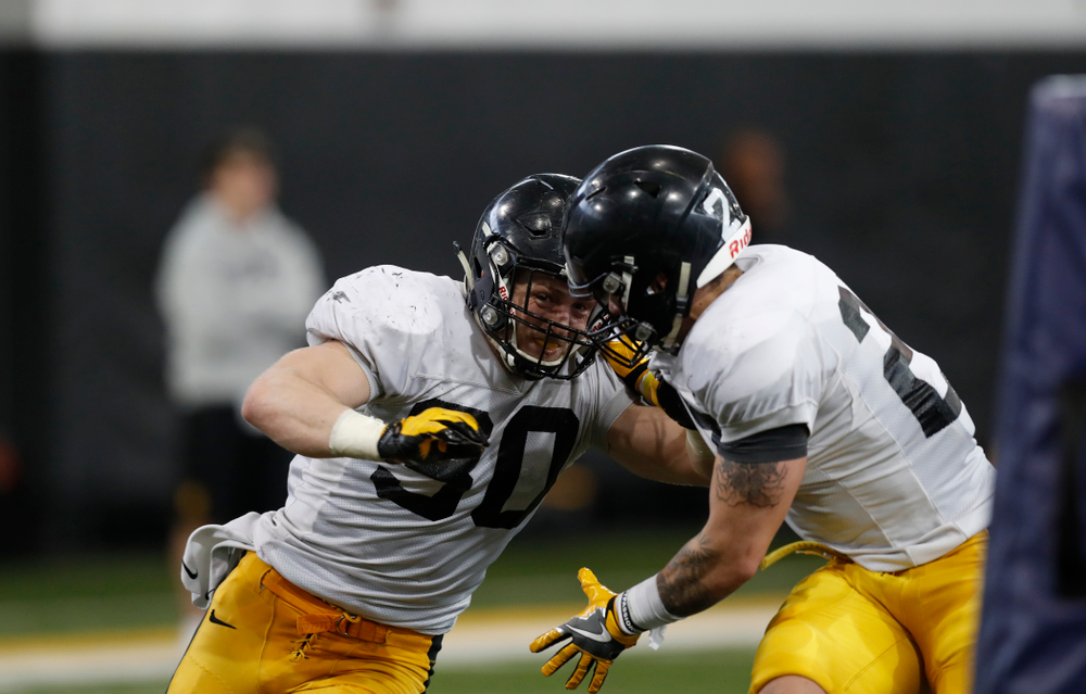 Iowa Hawkeyes defensive back Jake Gervase (30) and defensive back Amani Hooker (27) during spring practice Thursday, March 29, 2018 at the Hansen Football Performance Center. (Brian Ray/hawkeyesports.com)